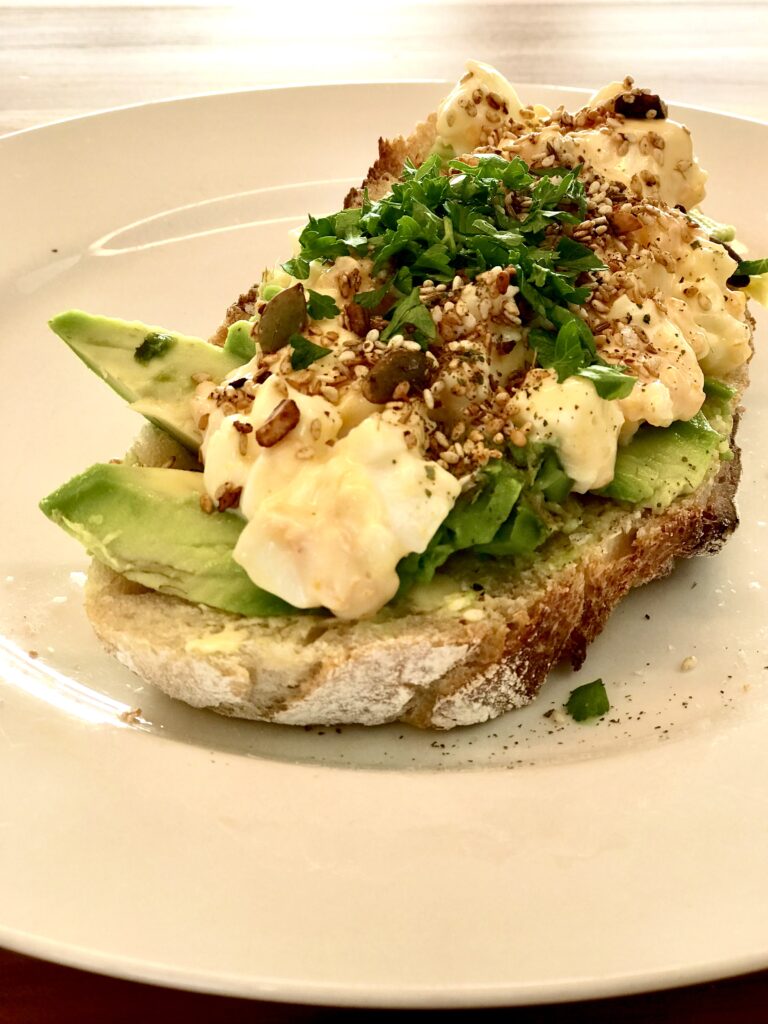 Eggs on freshly baked sourdough bread Freshly laid eggs on lodge baked sourdough